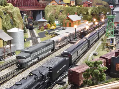 A close-up photo of the O-gauge model trains on the layout at the NNYCRRM  