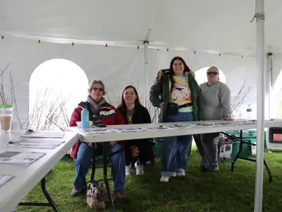 Volunteer group photo at Earth Day tree giveaway