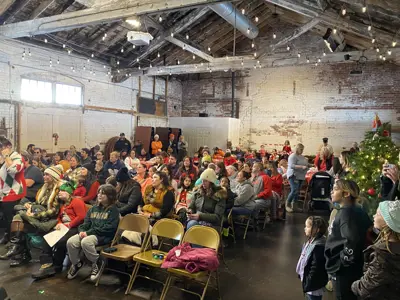 The museum event space filled with people during the yearly Santa event 