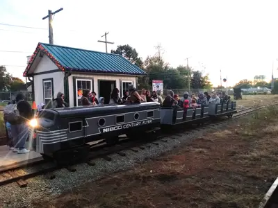 A trainload of passengers on the NIBCO Century Flyer for the NNYCRRM Spooktacular Express nighttime rides. 
