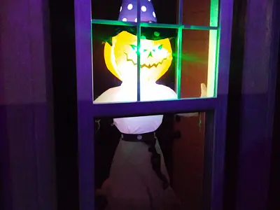 A witch/jack-o-lantern decoration in the window of the station house for the NIBCO Century Flyer at the NNYCRRM for the Spooktacular Express event. 