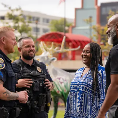 Corporals Skipper and Holmes Talking with Community Members