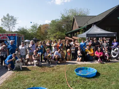 Costume contest group photo at Waggin' in the Woods event