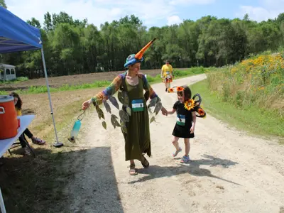 Participants in costume contest at Pollinator Promenade event