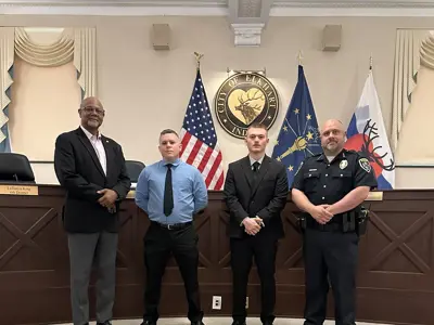 EPD New Hire Photo Featuring Two New Officer Hires Flanked by the Mayor and the Chief of Police