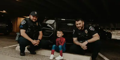 EPD Officers Posing with Junior Spiderman