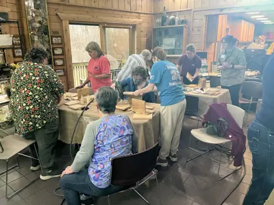 Participants making bird houses at program at EEC