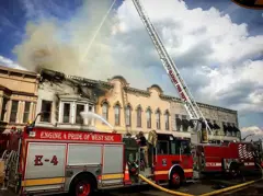 Engine 4 and old Quint 7 fighting a fire on Main street.