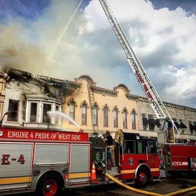 Engine 4 and old Quint 7 fighting a fire on Main street.