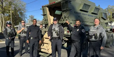 Community Relations Bureau Members with Police Equipment, Daycare Visit