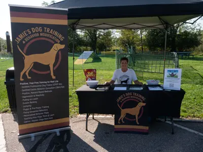 Jamie's Dog Training booth at Waggin in the Woods event 2025