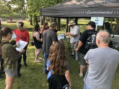 Volunteers giving away free rods and reels at Kids Free Fishing Clinic